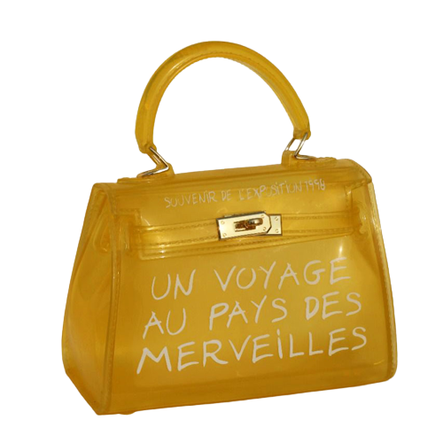 Un voyage bag yellow top